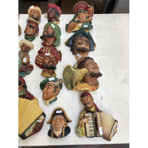 517 - Approx. eighty vintage Bossons chalkware head wall masks to include Chef, Spanish Lady, Snake charme... 