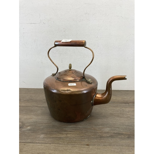 526 - A 19th century copper kettle - approx. 32cm high