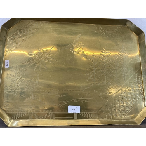 530 - Three pieces of brassware, one Japanese engraved brass rectangular serving tray - approx. 49cm wide ... 