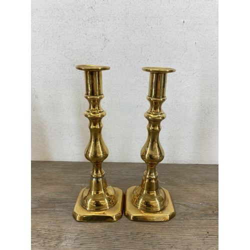 534 - Nine pieces of 19th century and later brassware, four pairs of candlesticks - largest approx. 23cm h... 