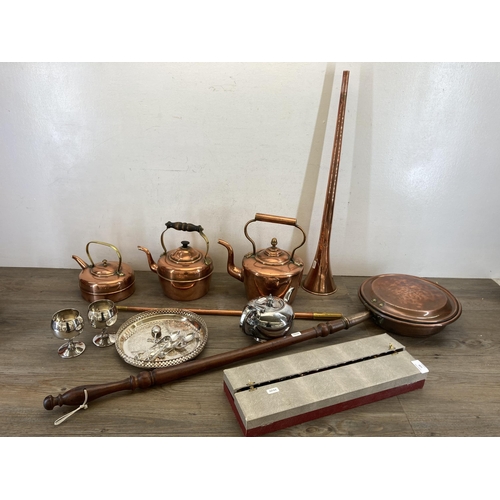 538 - A collection of metalware to include 19th century copper hunting horn, 19th century copper and mahog... 