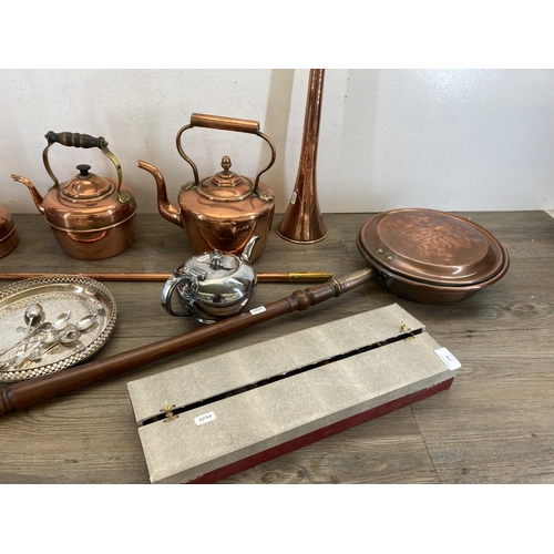 538 - A collection of metalware to include 19th century copper hunting horn, 19th century copper and mahog... 