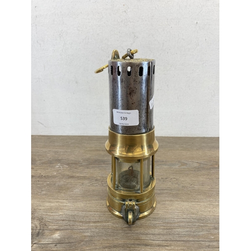 539 - An early 20th century Richard Johnson Clapham & Morris of Manchester brass and steel miner's lamp - ... 