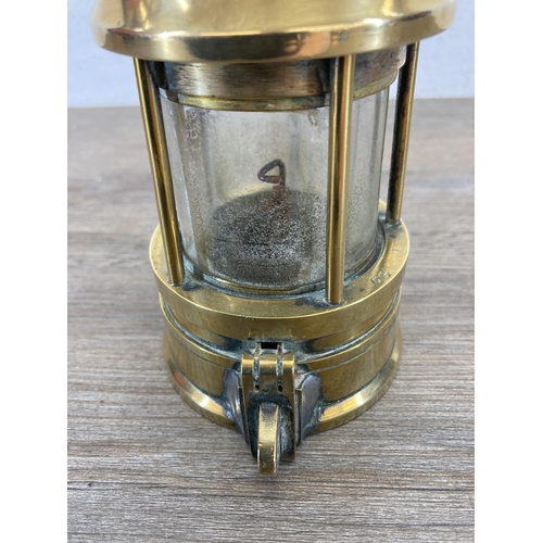 539 - An early 20th century Richard Johnson Clapham & Morris of Manchester brass and steel miner's lamp - ... 