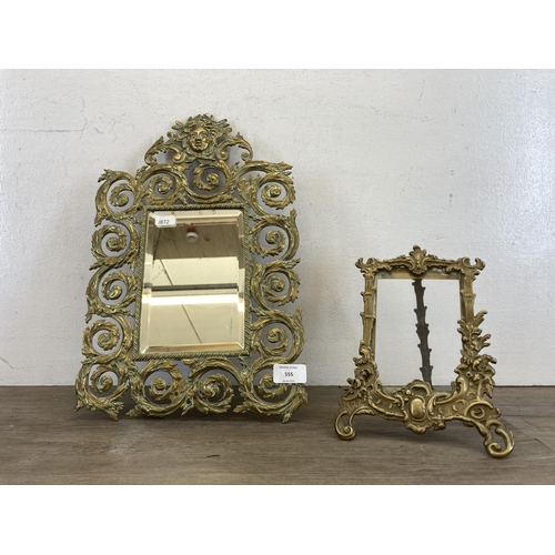 555 - Two brass framed items, one 19th century bevelled edge mirror - approx. 40cm high x 26cm wide and on... 