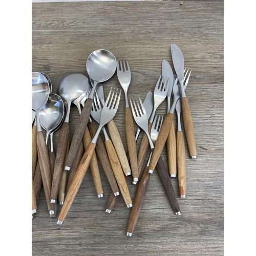 562 - A collection of 1960s Wallin Brothers of Sweden 'Safir' teak and stainless steel cutlery