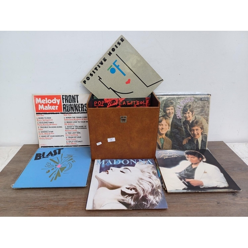 904 - A record case containing a collection of vinyl records to include Bruce Springsteen, Joan Armatradin... 