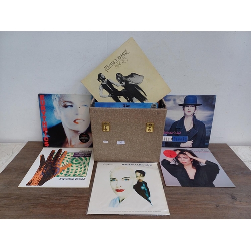 905 - A record case containing a collection of vinyl records to include Eurythmics, Jennifer Rush, Genesis... 