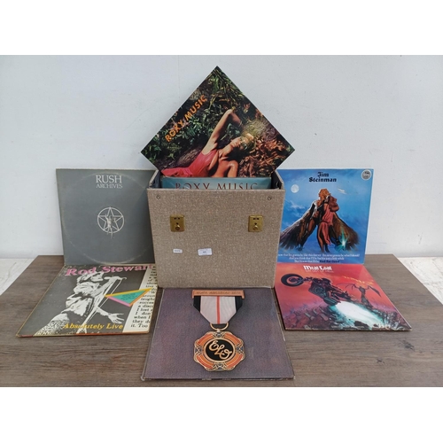 905 - A record case containing a collection of vinyl records to include Eurythmics, Jennifer Rush, Genesis... 