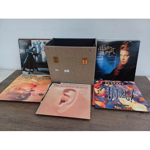 905 - A record case containing a collection of vinyl records to include Eurythmics, Jennifer Rush, Genesis... 