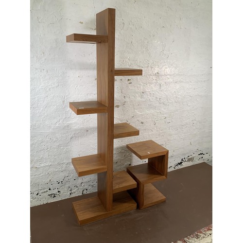 168 - A Dwell walnut effect shelving unit and matching side table - largest approx. 186cm high x 58cm wide... 