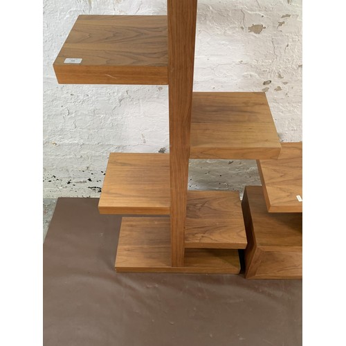168 - A Dwell walnut effect shelving unit and matching side table - largest approx. 186cm high x 58cm wide... 
