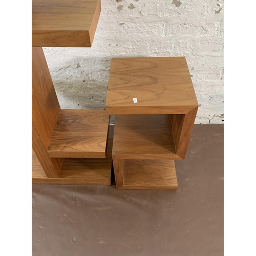 168 - A Dwell walnut effect shelving unit and matching side table - largest approx. 186cm high x 58cm wide... 