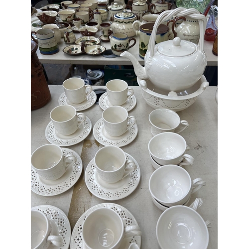 494 - A collection of Hartley Greens & Co. Leeds pottery creamware to include teapot and stand - approx. 3... 