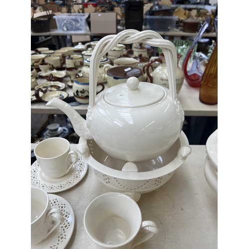 494 - A collection of Hartley Greens & Co. Leeds pottery creamware to include teapot and stand - approx. 3... 