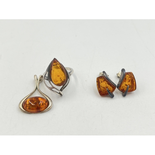 2008 - Three pieces of silver amber set jewellery, one solitaire ring, one pendant and one pair of earrings... 