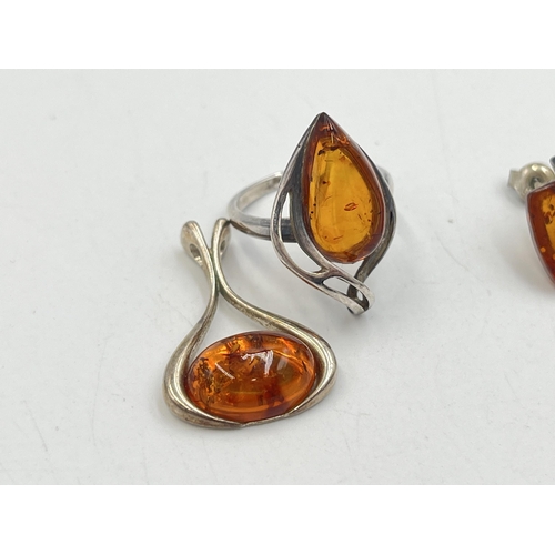 2008 - Three pieces of silver amber set jewellery, one solitaire ring, one pendant and one pair of earrings... 