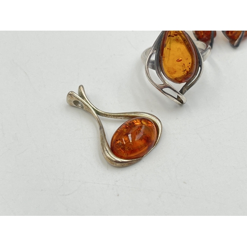 2008 - Three pieces of silver amber set jewellery, one solitaire ring, one pendant and one pair of earrings... 