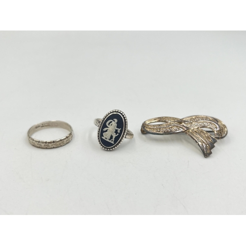 2017 - Three pieces of sterling silver jewellery, one Wedgwood black Jasperware ring, one H. Ltd ring and o... 