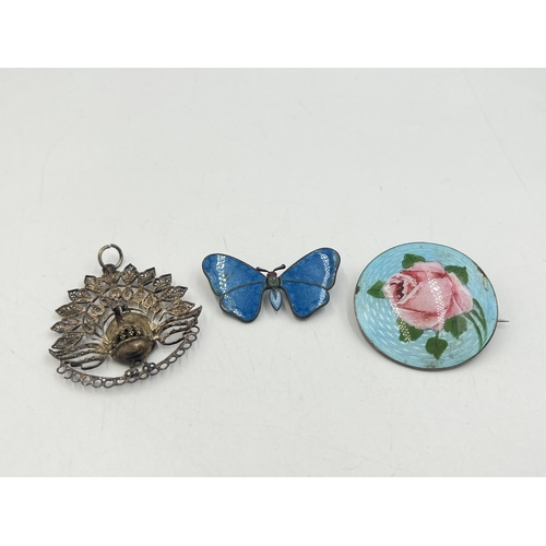 2019 - Three vintage pieces of jewellery, one .925 silver and enamel rose design circular brooch, one blue ... 