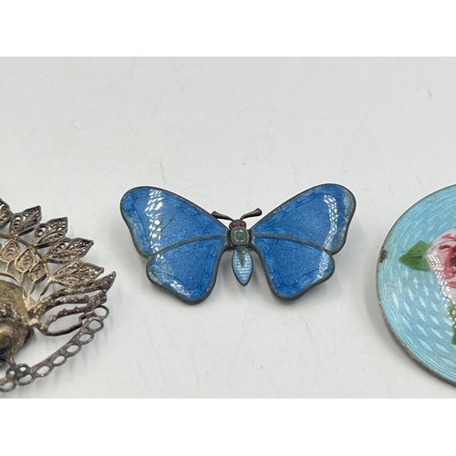 2019 - Three vintage pieces of jewellery, one .925 silver and enamel rose design circular brooch, one blue ... 