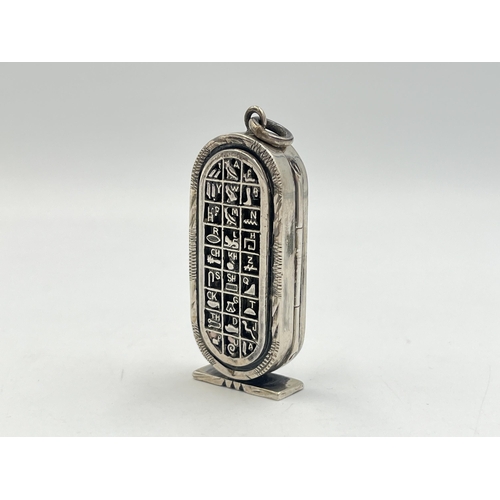 2022 - An Egyptian silver hieroglyphic design pendant/trinket box - approx. gross weight 25.4g