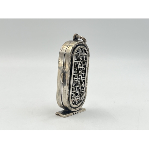 2022 - An Egyptian silver hieroglyphic design pendant/trinket box - approx. gross weight 25.4g