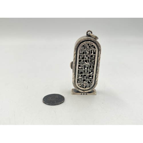 2022 - An Egyptian silver hieroglyphic design pendant/trinket box - approx. gross weight 25.4g