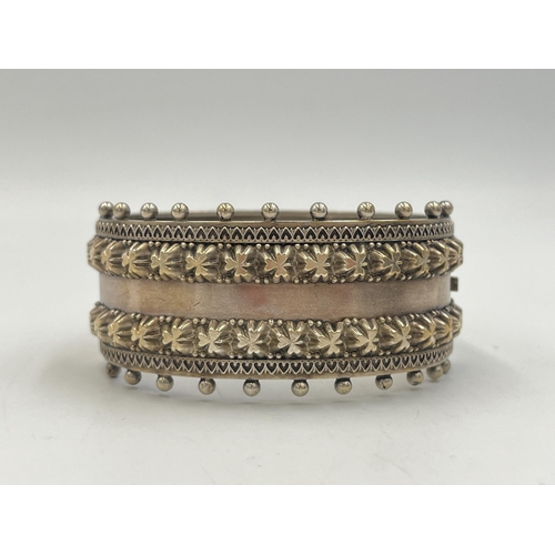 2028 - A Victorian Robert James Dick hallmarked Birmingham silver bangle with bead decoration, dated 1886 -... 