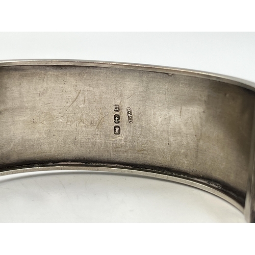 2028 - A Victorian Robert James Dick hallmarked Birmingham silver bangle with bead decoration, dated 1886 -... 