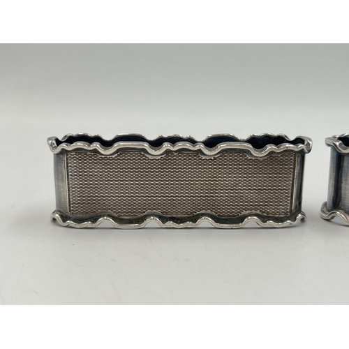 2034 - A pair of E. Hill hallmarked Birmingham silver napkin rings, dated 1956 - approx. gross weight 71g