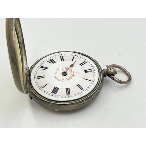 2039 - An .800 silver cased open face key wind pocket watch