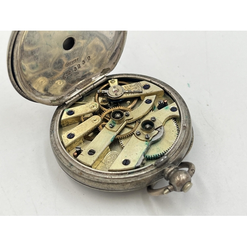 2039 - An .800 silver cased open face key wind pocket watch