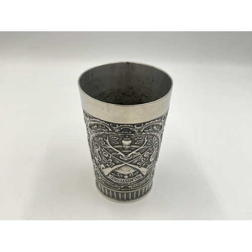 2054 - A vintage West German embossed pewter beaker - approx. 11cm high x 7.5cm diameter