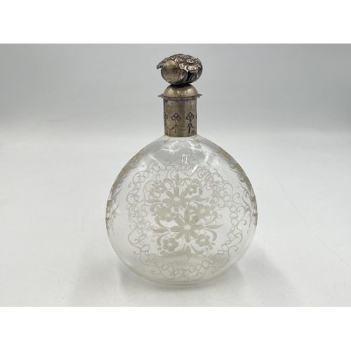 2055 - An antique continental etched glass scent bottle with .800 silver top - approx. 13cm high