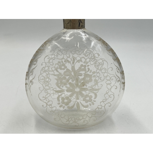 2055 - An antique continental etched glass scent bottle with .800 silver top - approx. 13cm high