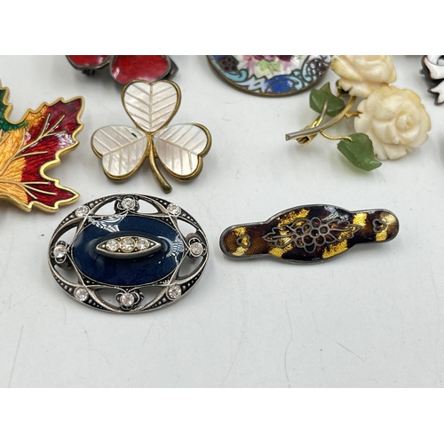 2057 - A collection of brooches to include Catherine Popesco France, sterling silver and enamel etc.