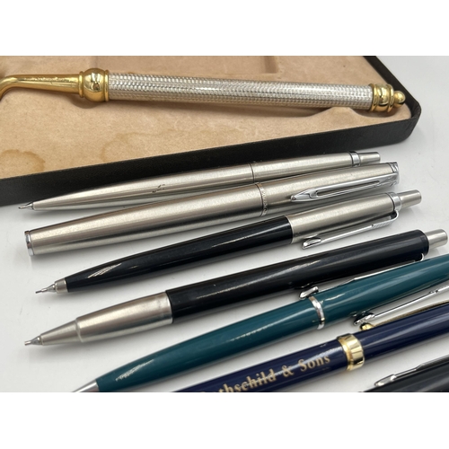 2064 - Eight writing instruments to include Waterman ballpoint pen, five Parker pencils etc. together with ... 