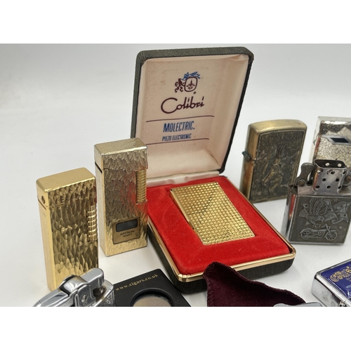 2066 - A collection of vesta cases and cigarette lighters to include boxed Colibri Molectric, Win 1000, Ron... 