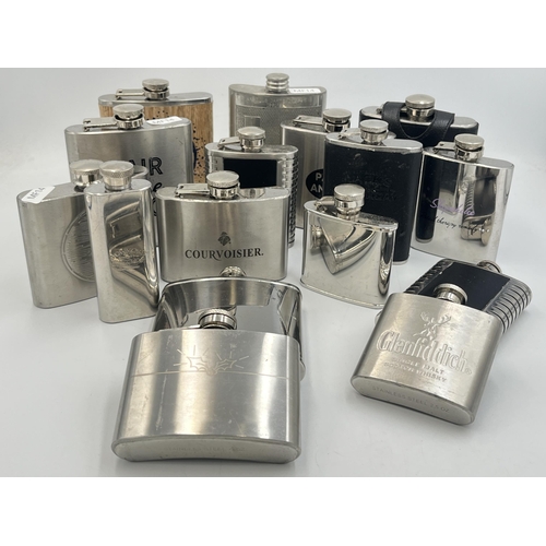 2067 - Sixteen stainless steel and pewter hipflasks