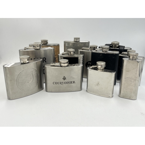 2067 - Sixteen stainless steel and pewter hipflasks