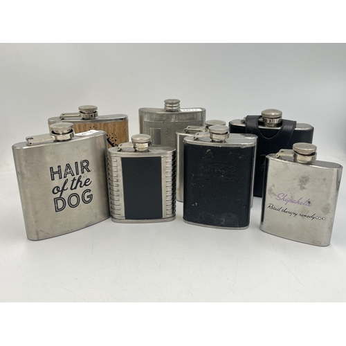 2067 - Sixteen stainless steel and pewter hipflasks