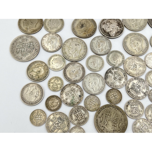 2071 - A collection of British pre-decimal coins to include approx. 314g of 50% silver examples