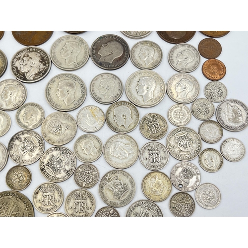 2071 - A collection of British pre-decimal coins to include approx. 314g of 50% silver examples