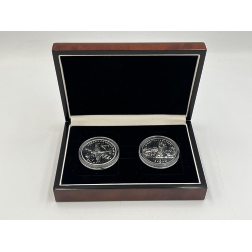 2075 - Two coin cases, one containing 1994 and 1995 Isle of Man one crowns and one containing 'Concorde Que... 