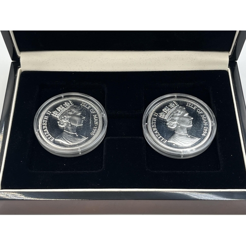 2075 - Two coin cases, one containing 1994 and 1995 Isle of Man one crowns and one containing 'Concorde Que... 