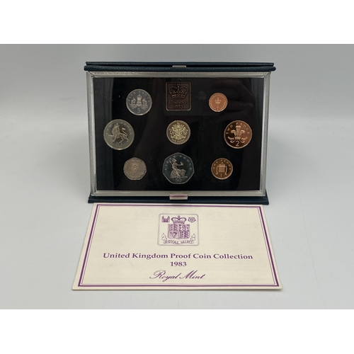 2080 - Three cased Royal Mint United Kingdom coin sets, one 1983 proof seven coin, one 1991 proof eight coi... 