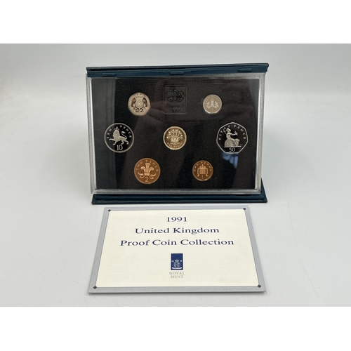 2080 - Three cased Royal Mint United Kingdom coin sets, one 1983 proof seven coin, one 1991 proof eight coi... 