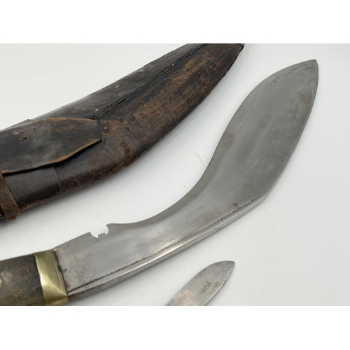 2096 - A Kukri knife with throwing knives and leather scabbard