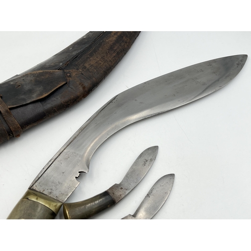 2096 - A Kukri knife with throwing knives and leather scabbard